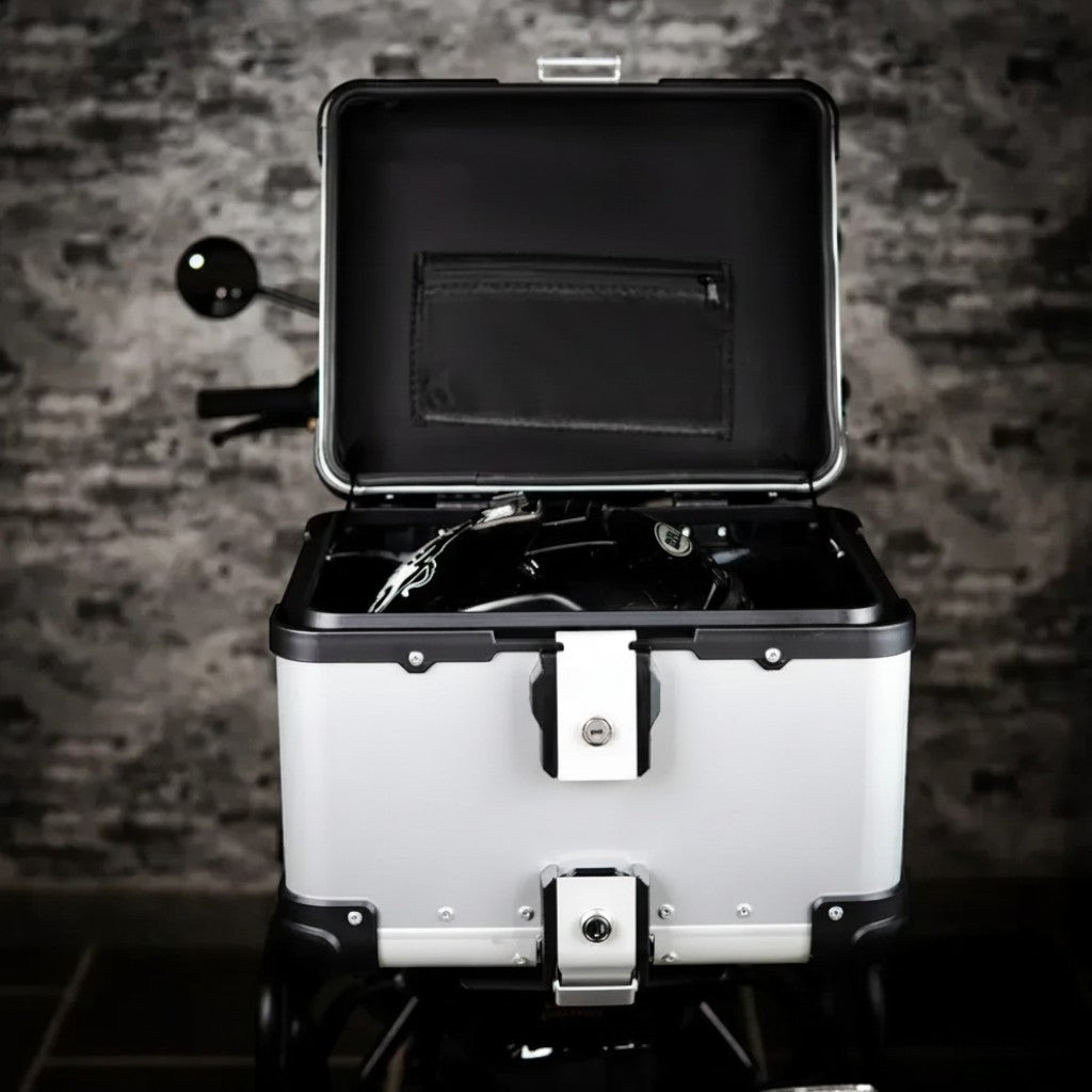 Motodrift ZANA 45L aluminium motorcycle top box in silver and black with open lid showing inner liner and storage