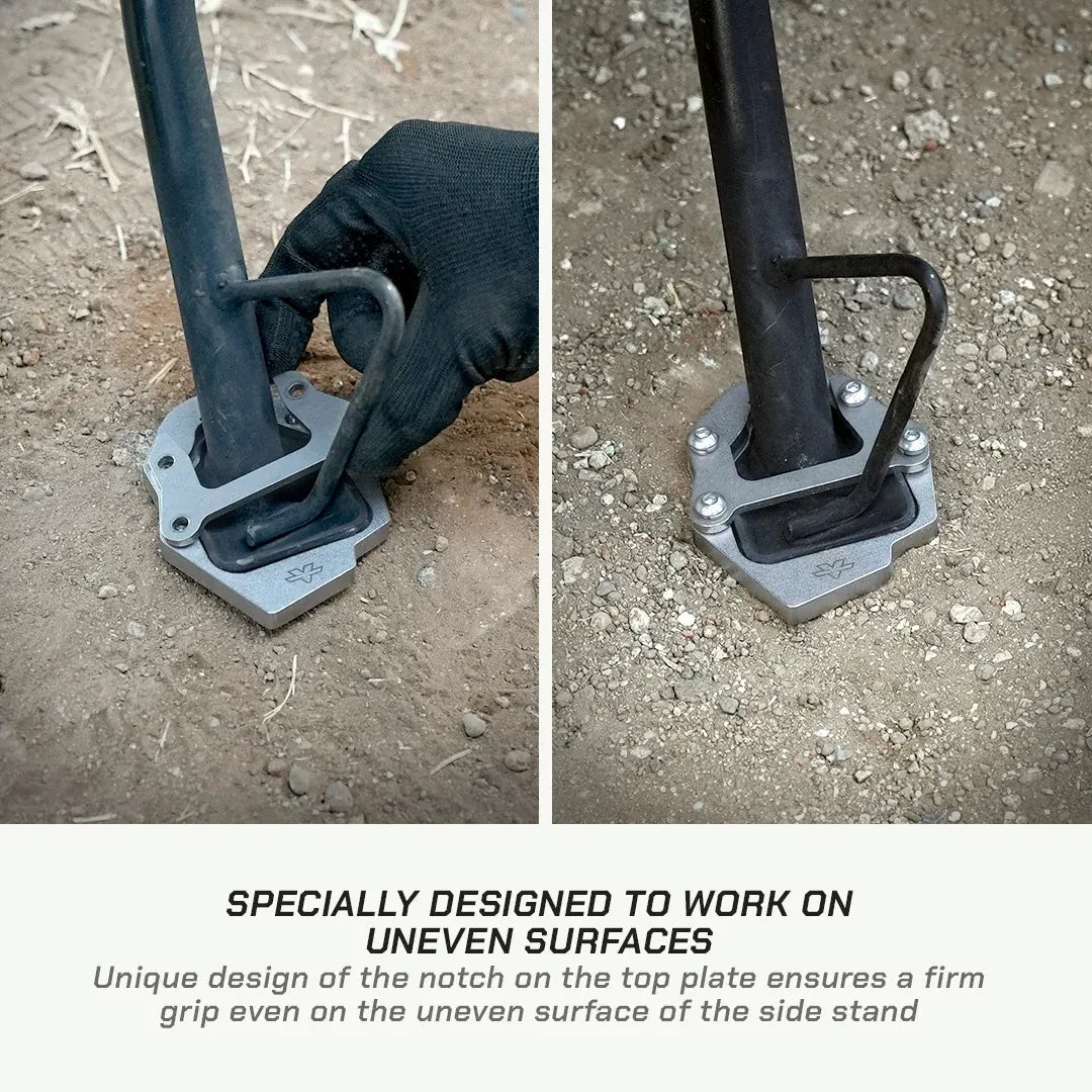 ViaTerra stainless steel side stand shoe installed on a Hero XPulse 210 motorcycle on uneven gravel ground.