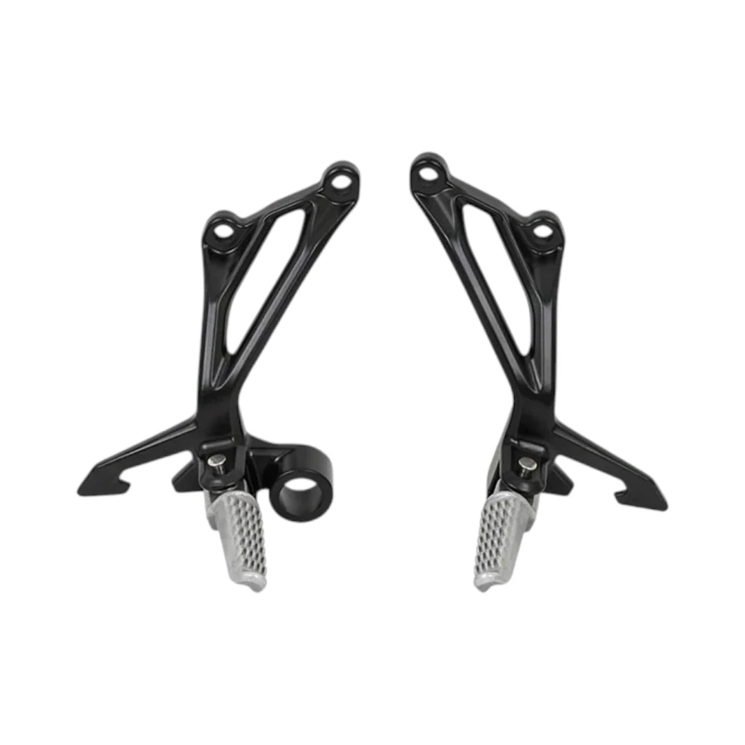 Black motorcycle rearset footrest assembly for Kawasaki Z900 with textured silver pegs